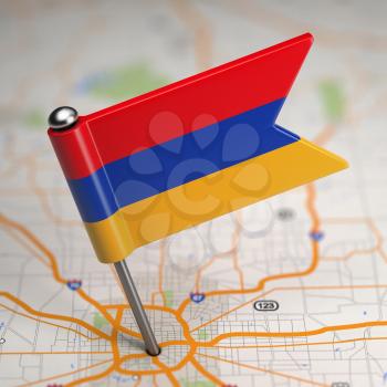 Small Flag Republic of Armenia on a Map Background with Selective Focus.