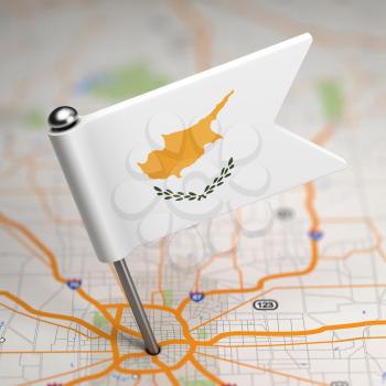Small Flag of Cyprus on a Map Background with Selective Focus.