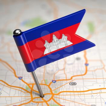 Small Flag of Cambodia Sticked in the Map Background with Selective Focus.