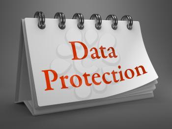 Data Protection - Red Words on White Desktop Calendar Isolated on Gray Background.