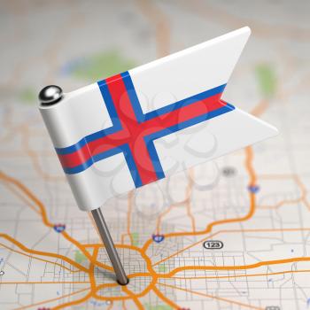 Small Flag of  Faroe Islands on a Map Background with Selective Focus.