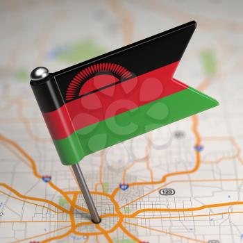 Small Flag Malawi on a Map Background with Selective Focus.