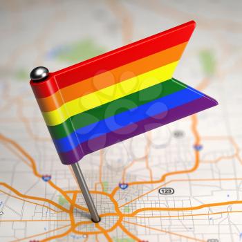 Small Flag of Gay on a Map Background with Selective Focus.