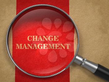 Change Management. Magnifying Glass on Old Paper with Red Vertical Line.