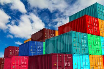 Multitiered of Colorful Cargo Containers on Sky Background. Logistics Concept.