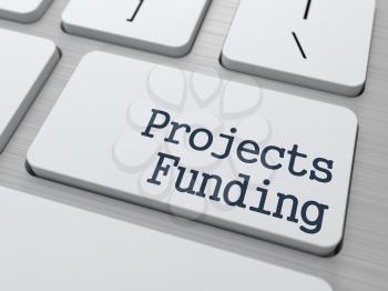 Projects Funding Concept. Button on Modern White Computer Keyboard. 