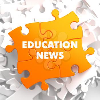 Education News on Orange Puzzle on White Background.