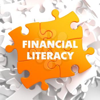 Financial Literacy on Orange Puzzle on White Background.