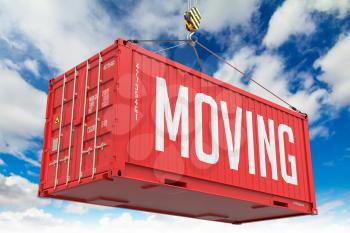 Moving - Red Hanging Cargo Container on Sky Background.