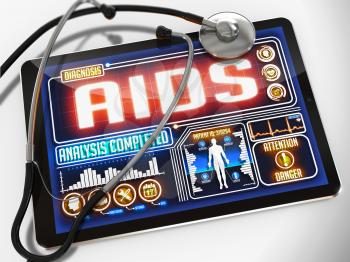 AIDS - Diagnosis on the Display of Medical Tablet and a Black Stethoscope on White Background.