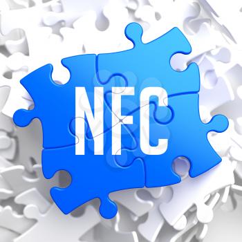 NFC on Blue Puzzle on White Background.