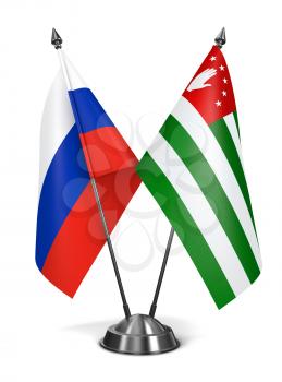 Russia and Abkhazia - Miniature Flags Isolated on White Background.