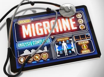 Migraine - Diagnosis on the Display of Medical Tablet and a Black Stethoscope on White Background.