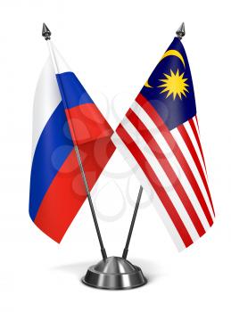 Russia and Malaysia - Miniature Flags Isolated on White Background.