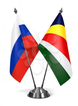 Russia and Seychelles - Miniature Flags Isolated on White Background.