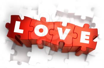 Royalty Free Clipart Image of Love Text on Puzzle Pieces