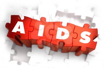 Royalty Free Clipart Image of AIDS Text on Puzzle Pieces