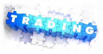 Trading - White Word on Blue Puzzles on White Background. 3D Illustration.