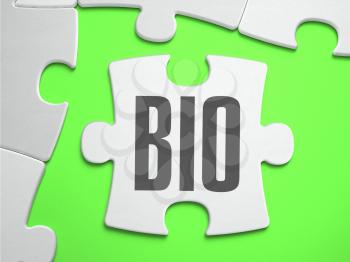 BIO - Text on Puzzle on the Place of Missing Pieces. Bright Green Background. Closeup. 3d Illustration.