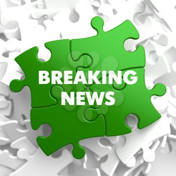Breaking News on Green Puzzle on White Background.