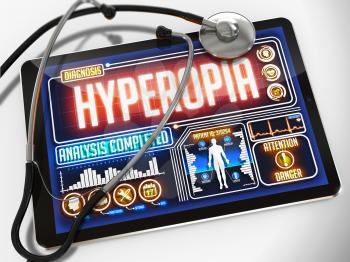 Hyperopia - Diagnosis on the Display of Medical Tablet and a Black Stethoscope on White Background.