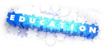 Education - White Word on Blue Puzzles on White Background. 3D Illustration.
