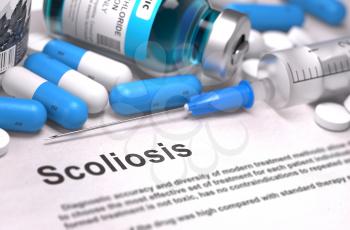Scoliosis - Printed Diagnosis with Blue Pills, Injections and Syringe. Medical Concept with Selective Focus.