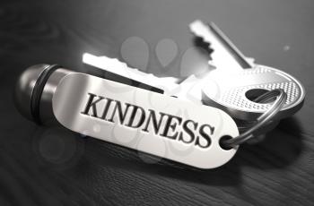 Kindness Concept. Keys with Keyring on Black Wooden Table. Closeup View, Selective Focus, 3D Render. Black and White Image.