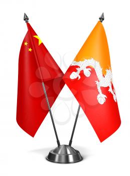 China and Bhutan - Miniature Flags Isolated on White Background.