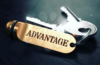 Keys with Word Advantage on Golden Label over Black Wooden Background. Closeup View, Selective Focus, 3D Render. Toned Image.