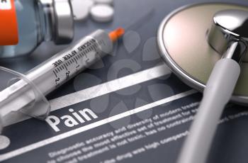 Pain - Medical Concept on Grey Background with Blurred Text and Composition of Pills, Syringe, Injection and Stethoscope. Selective Focus. 