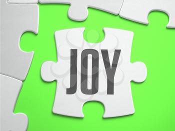 Joy - Jigsaw Puzzle with Missing Pieces. Bright Green Background. Close-up. 3d Illustration.