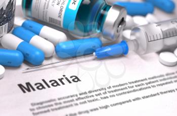 Malaria - Printed Diagnosis with Blurred Text. On Background of Medicaments Composition - Blue Pills, Injections and Syringe.
