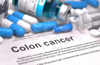 Colon Cancer - Printed Diagnosis with Blue Pills, Injections and Syringe. Medical Concept with Selective Focus.