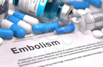 Embolism - Printed Diagnosis with Blue Pills, Injections and Syringe. Medical Concept with Selective Focus.