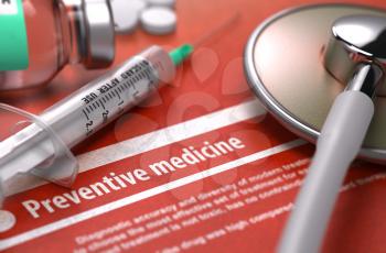 Preventive Medicine - Medical Concept on Orange Background and Medical Composition - Stethoscope, Pills and Syringe. Blurred Image.