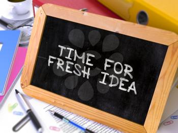 Time for Fresh Idea Handwritten by White Chalk on a Blackboard. Composition with Small Chalkboard on Background of Working Table with Office Folders, Stationery, Reports. Blurred, Toned Image.