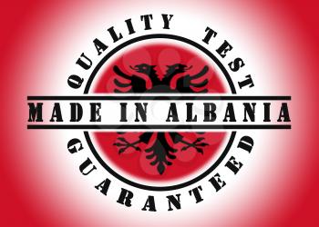 Quality test guaranteed stamp with a national flag inside, Albania