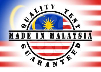 Quality test guaranteed stamp with a national flag inside, Malaysia