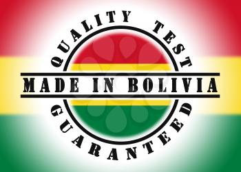 Quality test guaranteed stamp with a national flag inside, Bolivia