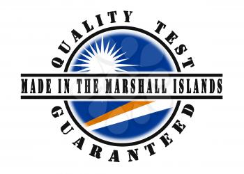 Quality test guaranteed stamp with a national flag inside, The Marshall Islands