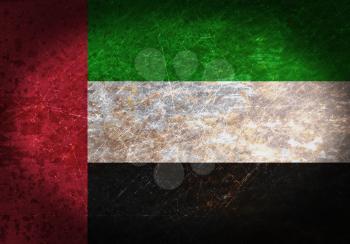 Old rusty metal sign with a flag - UAE