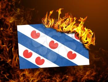 Flag burning - concept of war or crisis - Friesland