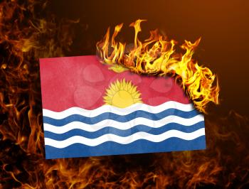 Flag burning - concept of war or crisis - Kiribati