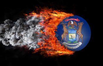 Concept of speed - Flag with a trail of fire and smoke - Michigan