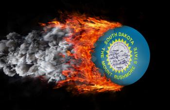 Concept of speed - Flag with a trail of fire and smoke - South Dakota