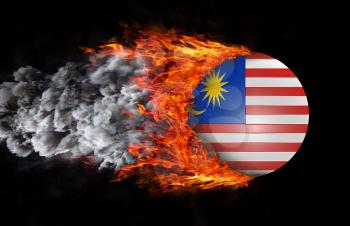 Concept of speed - Flag with a trail of fire and smoke - Malaysia