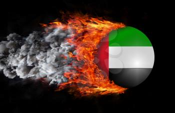 Concept of speed - Flag with a trail of fire and smoke - United Arab Emirates