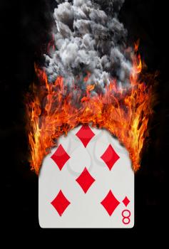 Playing card with fire and smoke, isolated on white - Eight of diamonds