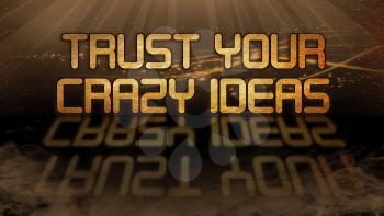 Gold quote with mystic background - Trust your crazy ideas